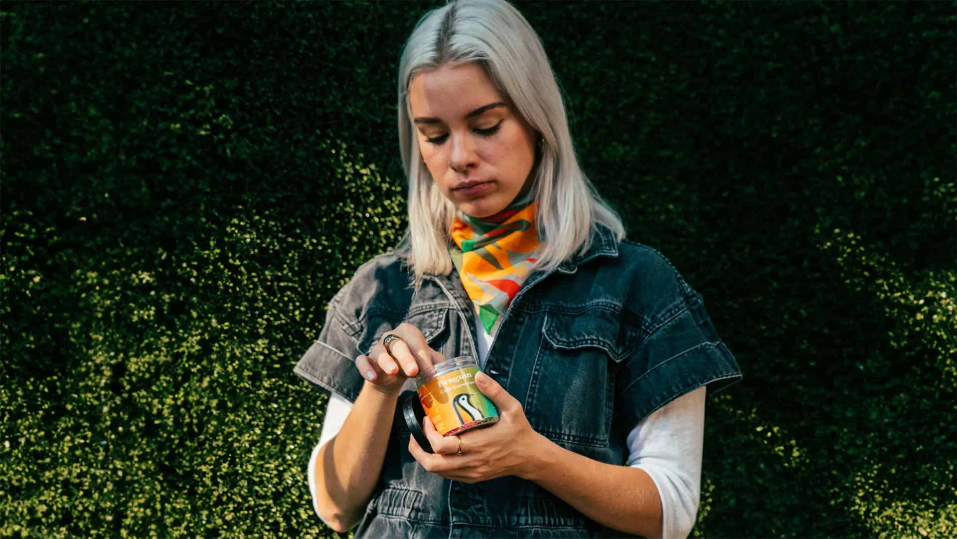 Woman eating CBD Gummies