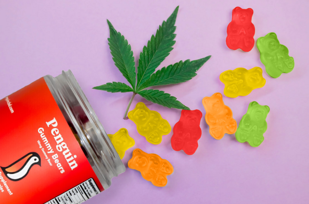 Penguin CBD Gummy Bears and Cannabis Leaf